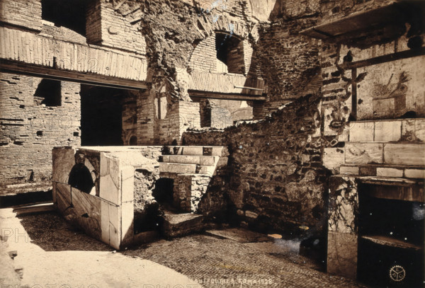 Partly ruined buildings in Ostia identified as a tavern or hot-food shop (thermopolium)..., 1928. Creator: Unknown.