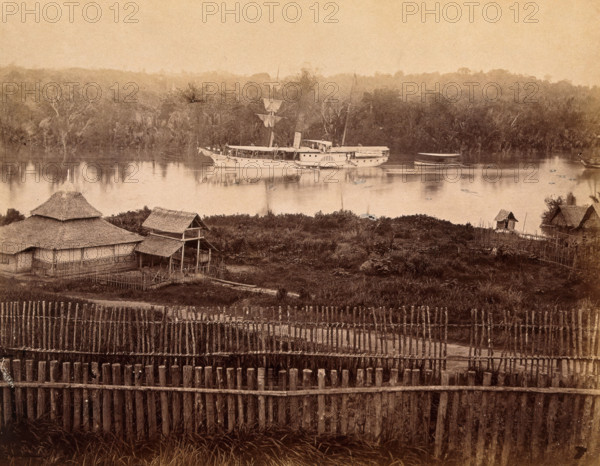 Malaya: steam yacht of the governor of the Straits Settlement on a Malaysian river, 1880. Creator: John Edmund Taylor.