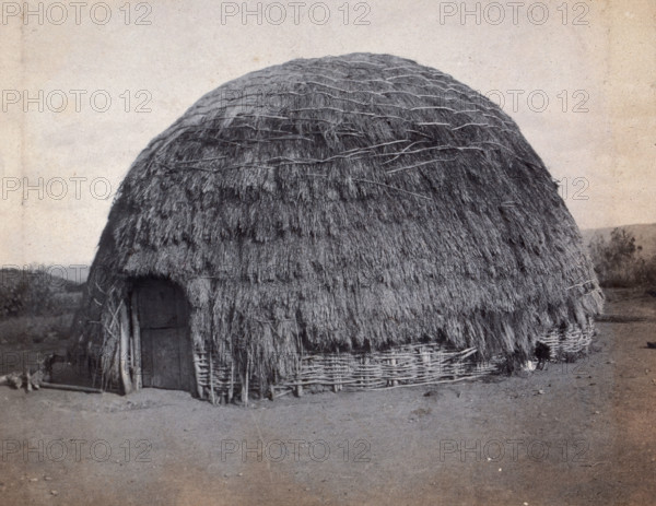 South Africa: an African kraal hut, 1905. Creator: Charles H Simpson.