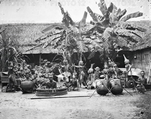 Siam (Thailand): a khon (masked dance drama) and lakhon (acting) troupe, 1865. Creator: John Thomson.