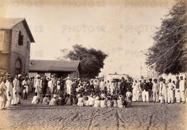 Staff of the Karachi plague committee in the town of Dhobi Ghat, during bubonic plague..., 1897. Creator: Unknown.
