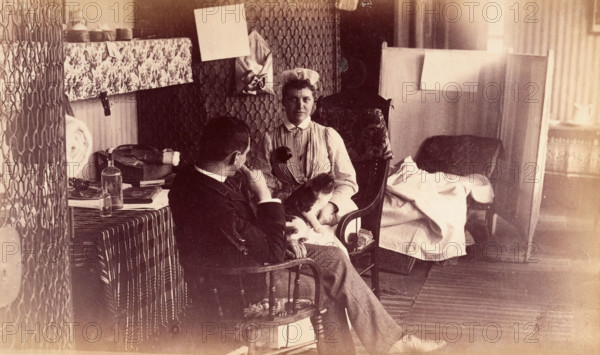 Bellevue Hospital, New York City: a nurse's sitting room (?), or end of ward..., 1885-1898. Creator: Unknown.