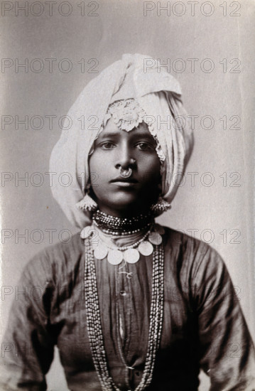 A young Hindu girl, perhaps a princess, in a studio setting, c1900. Creator: Unknown.