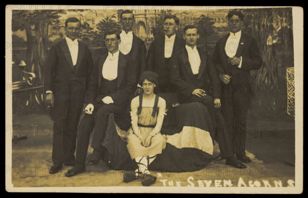 Seven men on stage set of "The seven acorns", [between 1918 and 1920?]. Creator: Unknown.