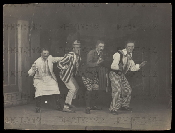 Sailors on stage in mid-pose, wearing a variety of costumes, [between 1910 and 1919?]. Creator: Unknown.