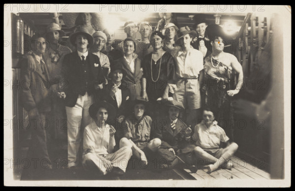 Passengers on RMS Armadale Castle, some in drag, pose for a group portrait, 1933. Creator: Unknown.