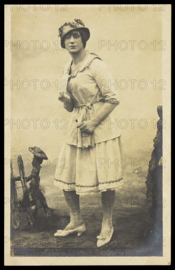 An actor, in drag, performing English theatre at a prisoner of war camp in Cottbus, [1910-1919?]. Creator: Unknown.