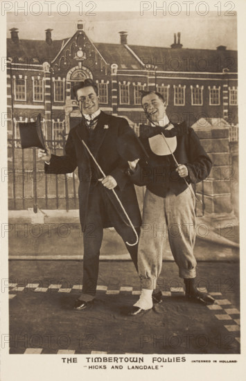 Two British soldiers dressed smartly, performing for "The Timbertown Follies", at a..., [1910-1919?] Creator: Unknown.