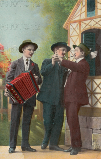 Two Dutch men dancing together, accompanied by an accordionist, (between 1900 and 1909?). Creator: Unknown.
