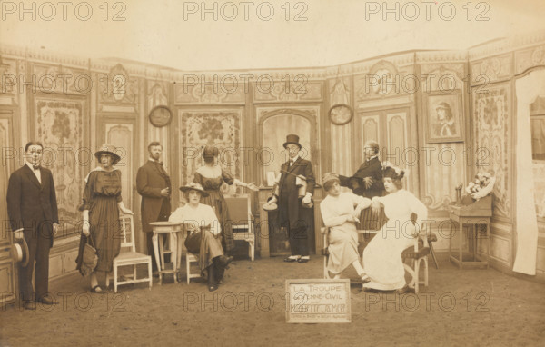 Prisoners of war, some in drag, posing on stage in 'Miquette et sa mere' at..., (1910-1919?). Creator: Unknown.