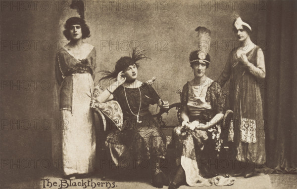 Amateur actors in drag, pose on stage as "The Blackthorns", (between 1910 and 1919?). Creator: Unknown.