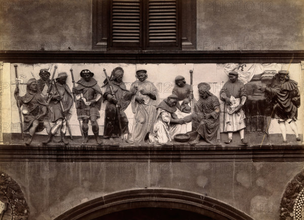 Ospedale del Ceppo, Pistoia: part of the sculpted relief of the works of mercy, c1860s. Creator: Fratelli Alinari.