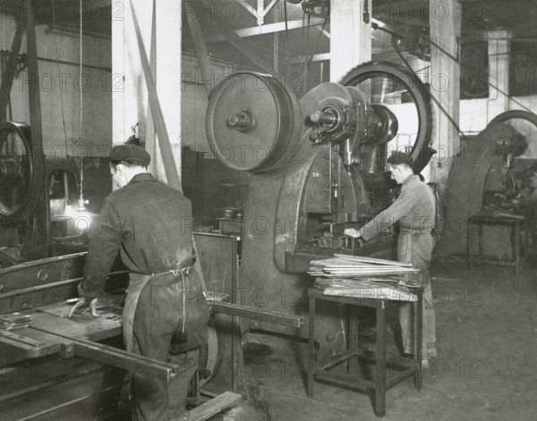 Production line of a company who manufacture motorcycle components, Barcelona, Spain, 1945. Creator: Unknown.