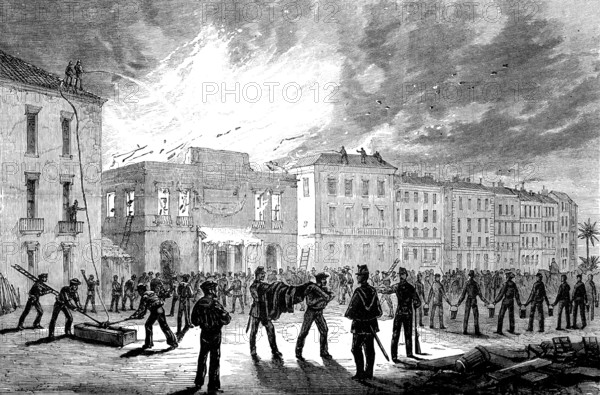 Burning of the Municipal Theatre at Nice: the fire viewed from the Rue St. Francis de Paul, 1881. Creator: Unknown.