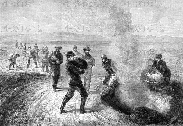 The Tourist in Iceland: feeding the Strökr, or Churn Geysir, 1881. Creator: Unknown.