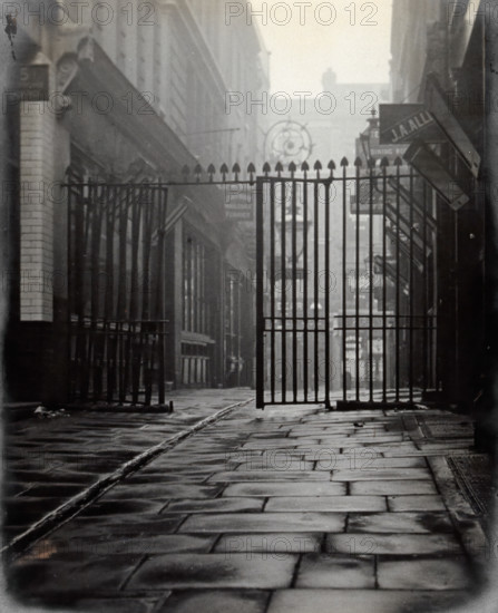 The church of St Bartholomew the Great and surrounding area; iron gates leading to..., 1909 Creator: GW Miller.