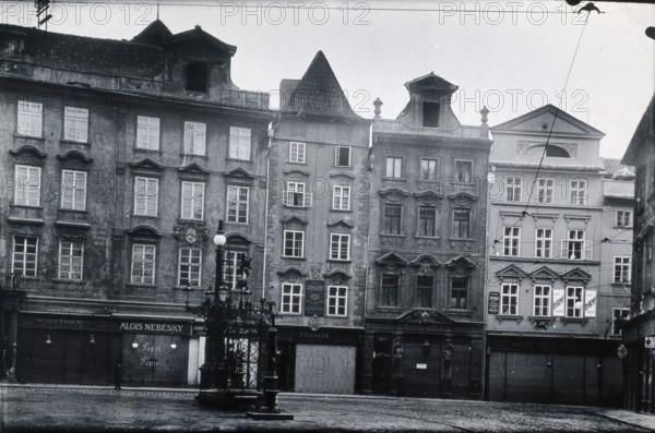 The front of a pharmacy in a cobbled square in Prague, c1890s. Creator: Zikmund Reach.
