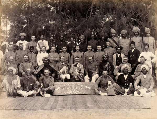 Staff of the Runchore segregation camp, set up by the Karachi Plague Committee, India, 1897. Creator: Unknown.