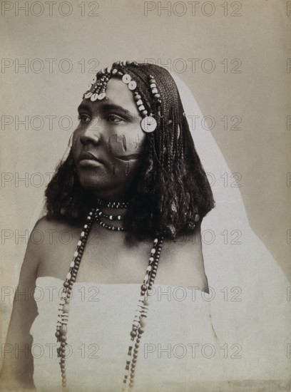 A North African woman with scarification on her cheeks, c1900. Creator: Gabriel Lekegian.