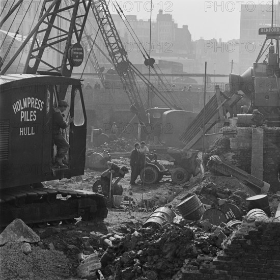 A crane at work on the post-war redevelopment of the Barbican Estate, London, 1962-1964. Creator: John Gay.