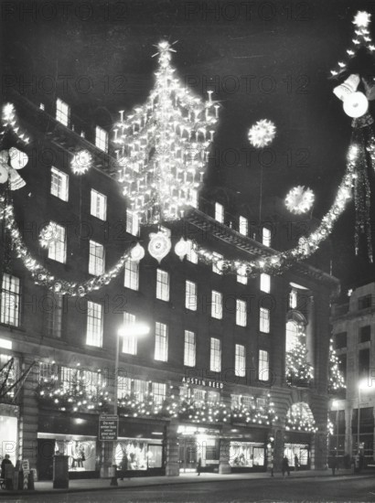 Christmas illuminations on Regent Street, West End, looking to Austin Reed at 103-113, London, 1970. Creator: Unknown.