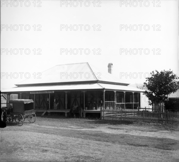 Upper Coomera Hotel - horse drawn wagon in front of hotel, 1888. Creator: Robert Augustus Henry L'Estrange.