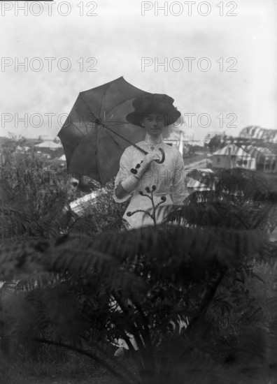 Unknown woman at "Cnoc Rhu", Victoria Street, Red Hill, c1900s. Creator: Robert Augustus Henry L'Estrange.