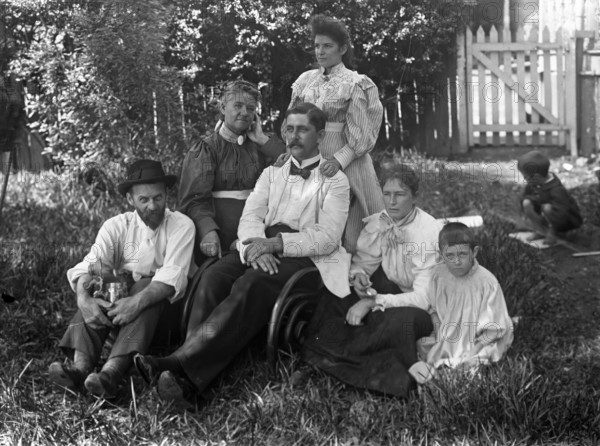 Unknown family portrait, c1900s. Creator: Robert Augustus Henry L'Estrange.