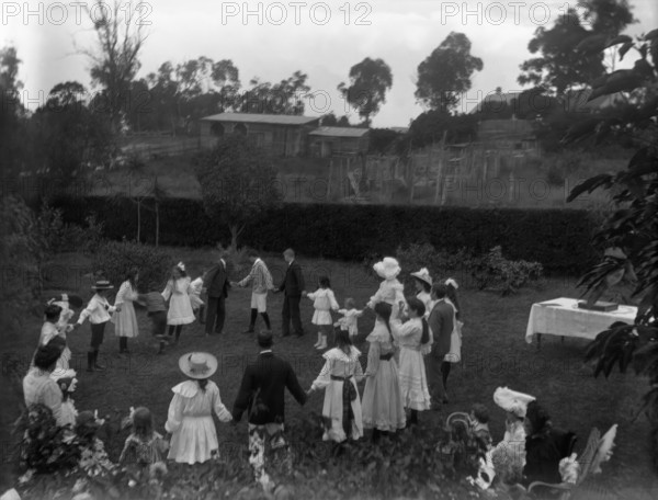 Children's party in the grounds of the Herston residence, Coralyn (Clyde Road), 1907. Creator: Robert Augustus Henry L'Estrange.
