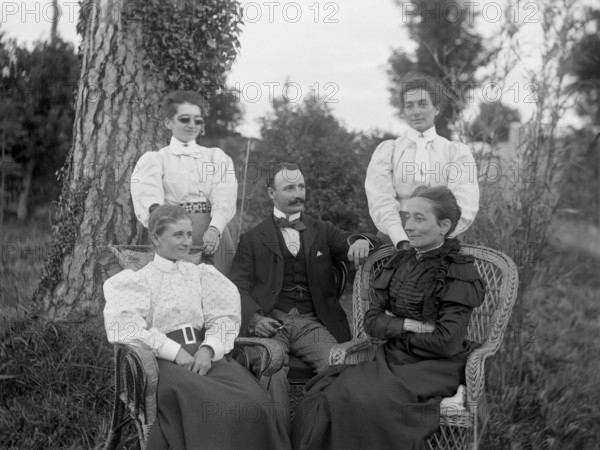 Family photo of William Manderville Ellis L'Estrange (seated centre) and Elizabeth Ely..., 1906. Creator: Robert Augustus Henry L'Estrange.