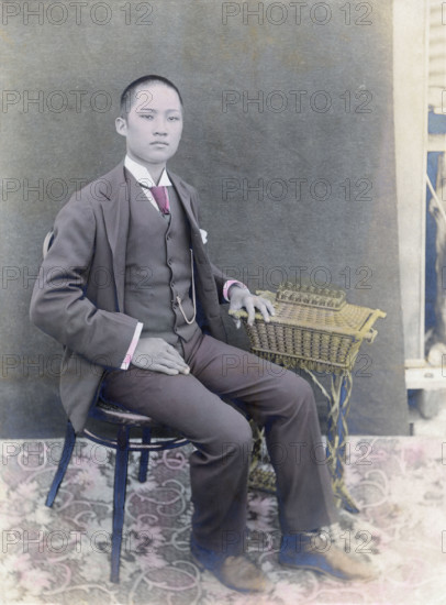 Chinese man who owned an orange orchard in Newcastle California, 1902. Creator: Robert Augustus Henry L'Estrange.