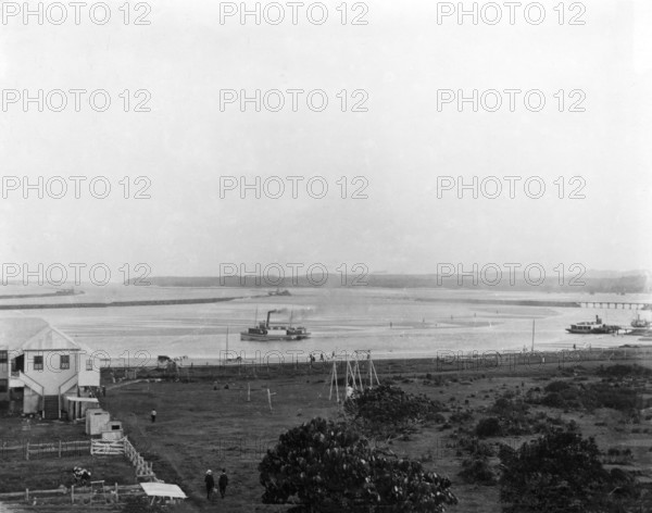 Tweed River and Training Wall, taken from Greenmount  (Hill Street, Coolangatta, Qld.), 1904. Creator: Robert Augustus Henry L'Estrange.