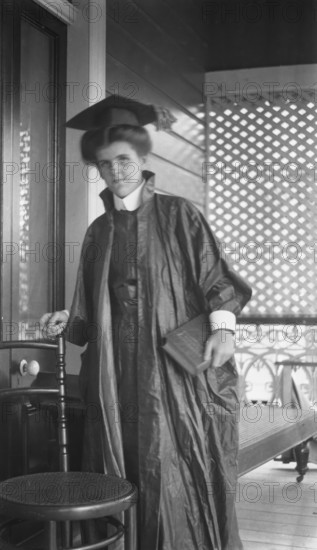 Unknown lady in graduation cap and gown, c1900s. Creator: Robert Augustus Henry L'Estrange.