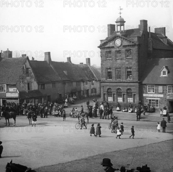 Town street scene - Plume of Feathers Inn, possible Dorset England, c1900s. Creator: Robert Augustus Henry L'Estrange.