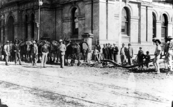 Workers ploughing Queen Street and Creek Street corner, Brisbane, Queensland, c1889. Creator: Unknown.