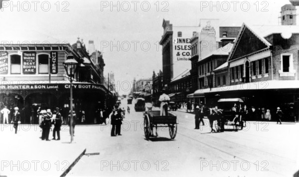 Policeman directs traffic at the intersection of Queen and Edward St, Brisbane, Queensland, c1908. Creator: Unknown.