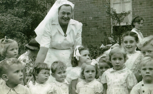 Matron Joan Gardner and children at St Monan's Hospital, 1952. Creator: Unknown.