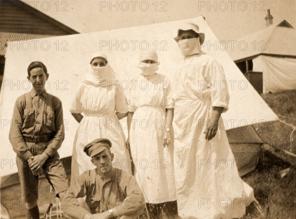 Ethel Newland and fellow nurses and military, c1918. Creator: Unknown.