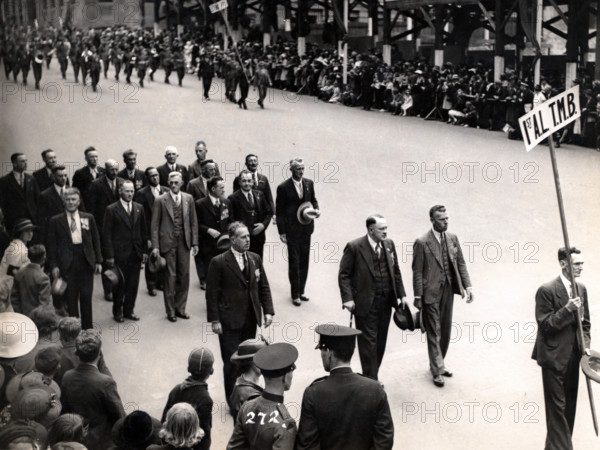 Capt Frank Page MC (with walking stick), Anzac Day march, year unknown. Creator: Unknown.