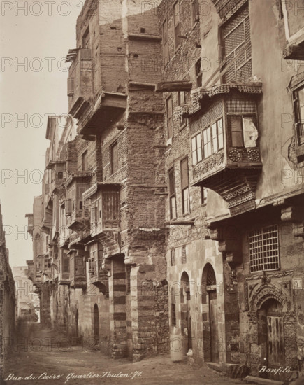 Street in the Area of Ibn Tulun Mosque, Cairo, 19th century. Creator: Maison Bonfils.