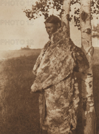 Cree Woman with Fur Robe, 1926. Creator: Edward Sheriff Curtis.