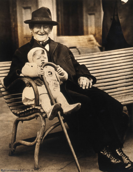 John Daubeny, a centenarian, holding a 1 year old boy, c1922. Creator: Unknown.