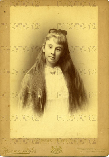 Portrait photography of an unknown teenage girl with beautiful long hair. Creator: Unknown.