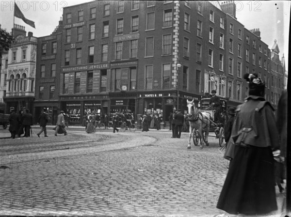 Racine Watch and clock makers building established 1833 (Ireland), 1895. Creator: Robert Augustus Henry L'Estrange.