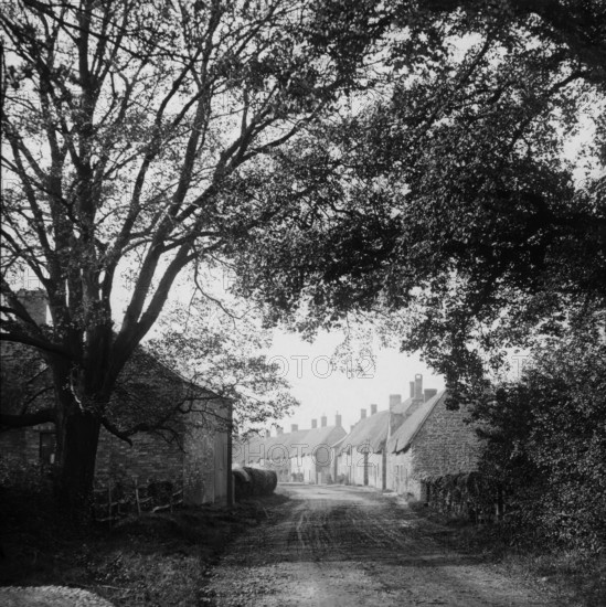 Village Road, possibly Ireland, c1890s. Creator: Robert Augustus Henry L'Estrange.