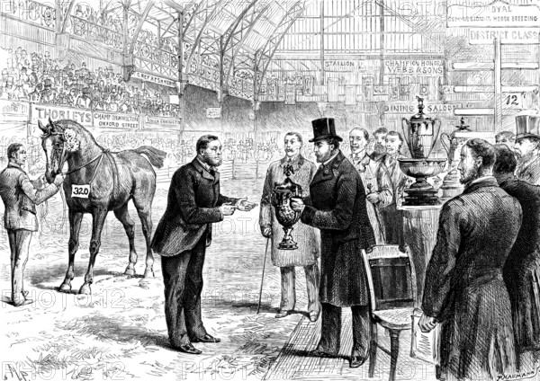 London House Show: the Prince of Wales presenting cup to Mr. Moore for his Hackney horse Rufus, 1890 Creator: P Naumann.