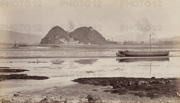 Dumbarton Castle and pier on the Clyde, between 1870 and 1880. Creator: James Valentine.