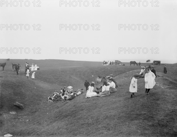 Bank Holiday picnic on the earthwork remains on White Horse Hill, Uffington, Oxfordshire, 1860-1922. Creator: Henry Taunt.