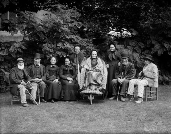 Group portrait of the nine oldest inhabitants of the village, West Ilsley, West Berkshire, 1860-1922 Creator: Henry Taunt.