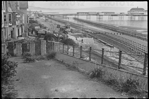 View looking south along the beach at Shanklin, showing Admiralty scaffolding, Isle Of Wight, 1945. Creator: George R Long.